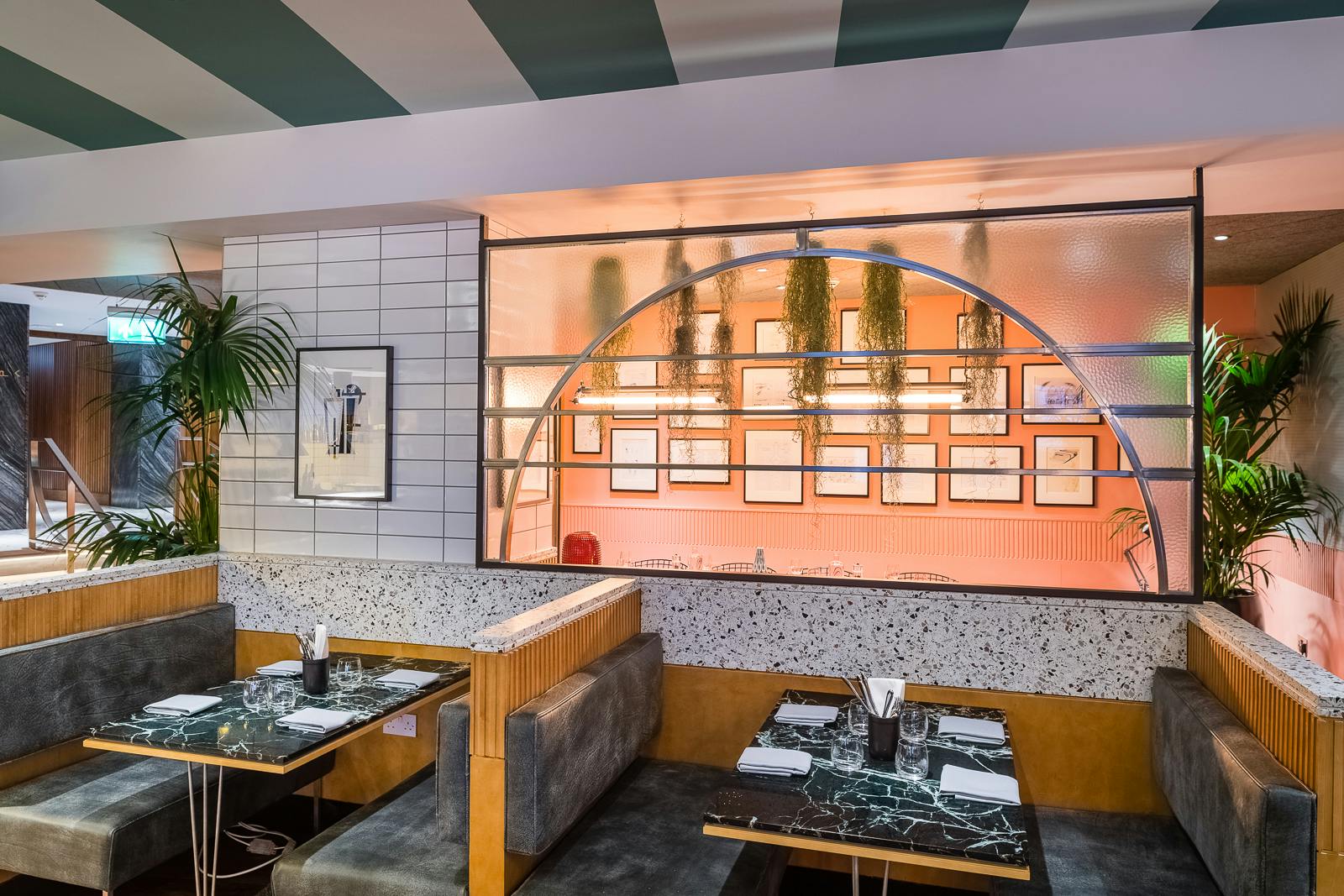 Shakedown Restaurant dining area with cozy booths, ideal for corporate events and gatherings.