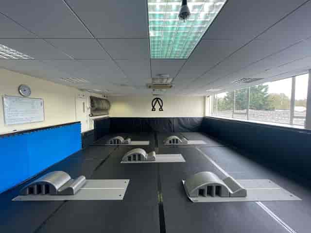BJJ studio in High Barnet, featuring a rubberized floor for fitness and wellness events.