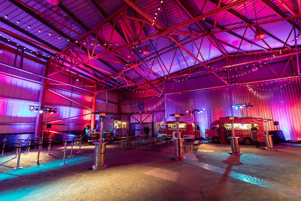 Troubadour Wembley Park Theatre with vibrant lighting, ideal for events and gatherings.