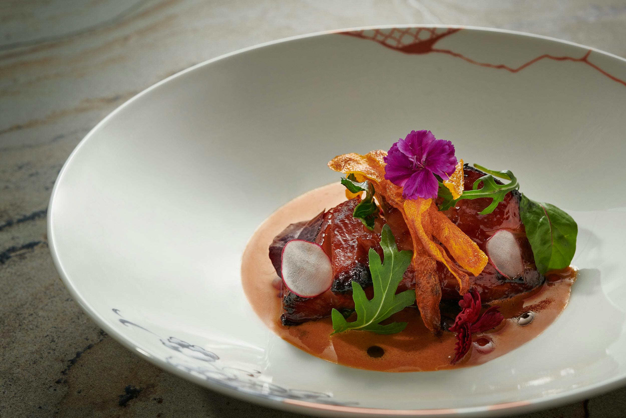 Elegant dish at Straits Kitchen, perfect for upscale dining events and gourmet menus.