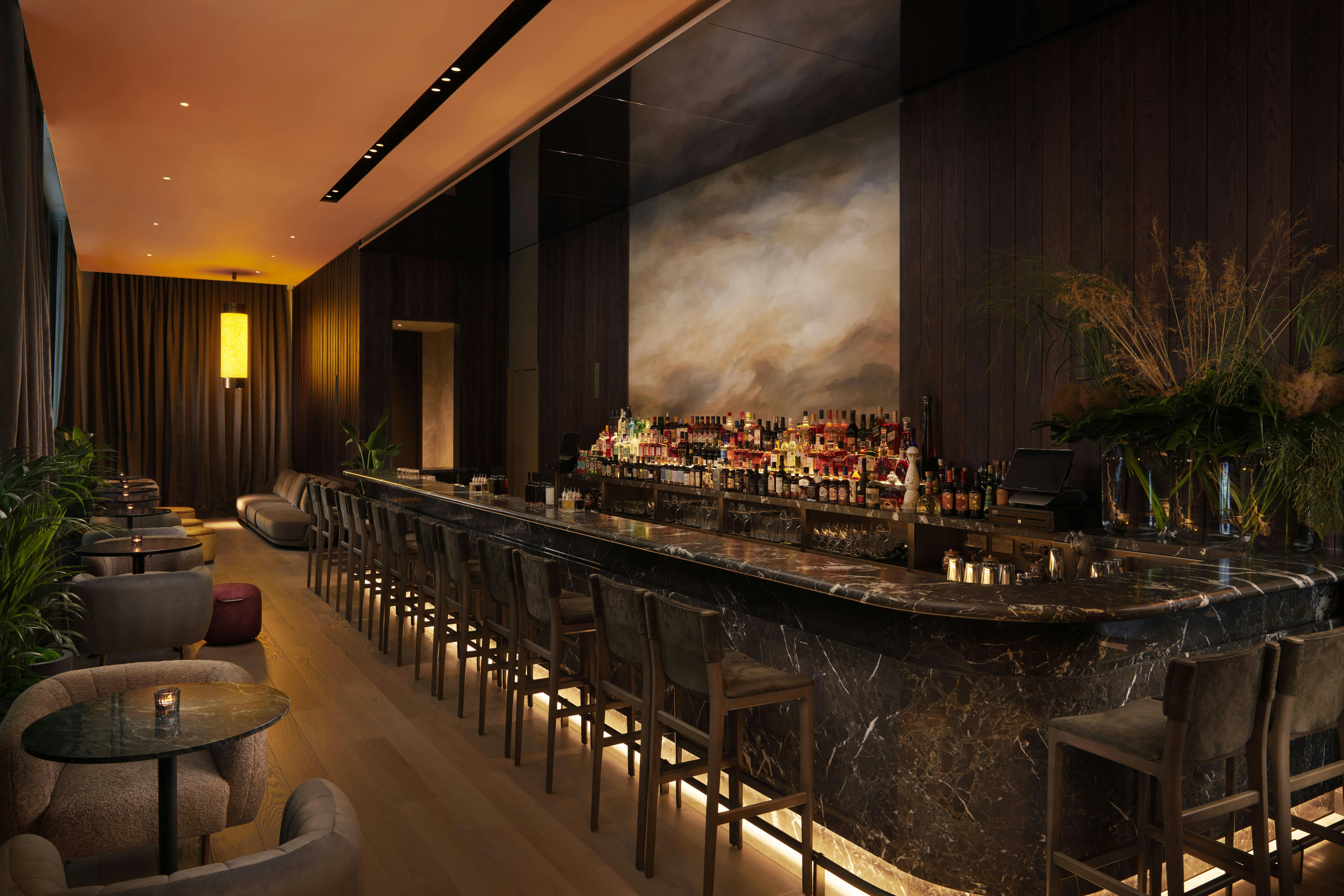 Ginger Lily bar with marble counter, ideal for networking events and cocktail receptions.