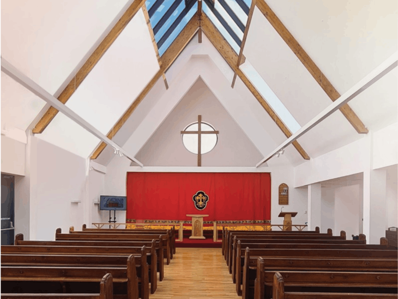 St James Mar Thoma Church Hall with high ceilings, perfect for workshops and community events.