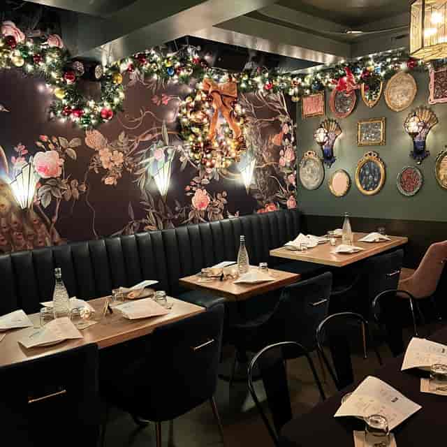 Elegant dining space at The Peacock Lounge, ideal for intimate gatherings and events.