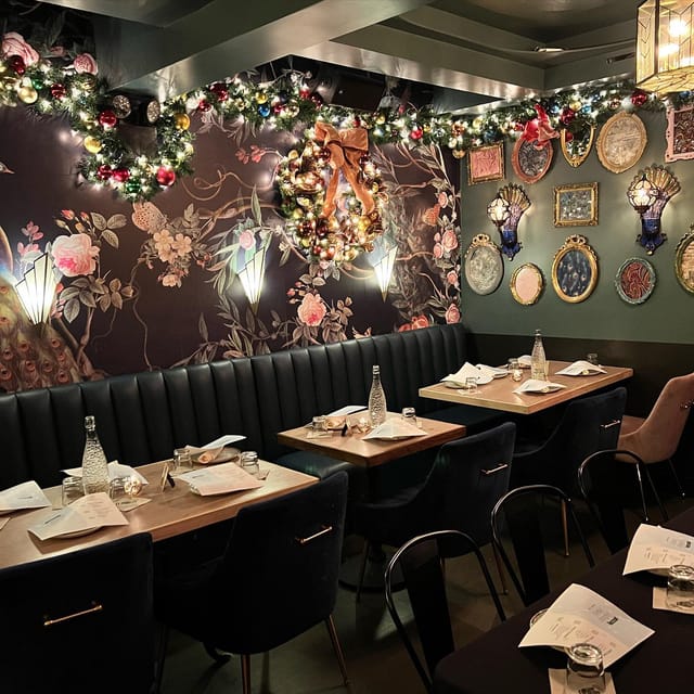 Elegant dining space at The Peacock Lounge, ideal for intimate gatherings and events.