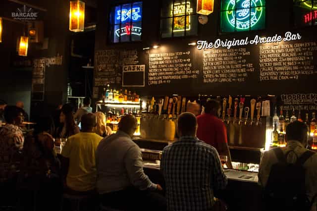 Barcade Newark: vibrant bar with arcade games for casual networking events and gatherings.