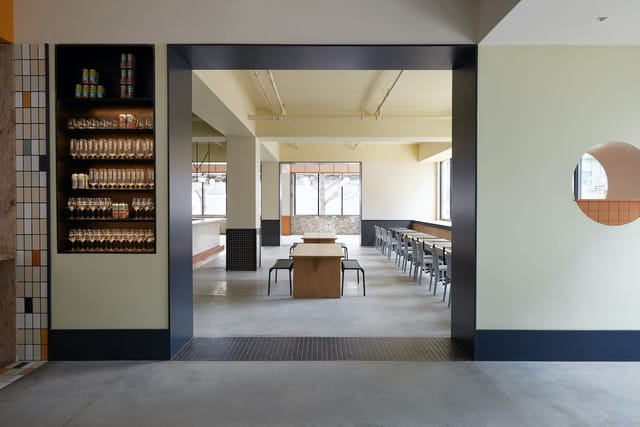 Modern event space at Talea Beer Co. with natural light, ideal for meetings and workshops.