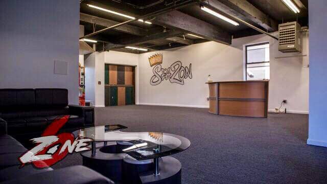 Modern event space with graffiti art, perfect for meetings and social gatherings.