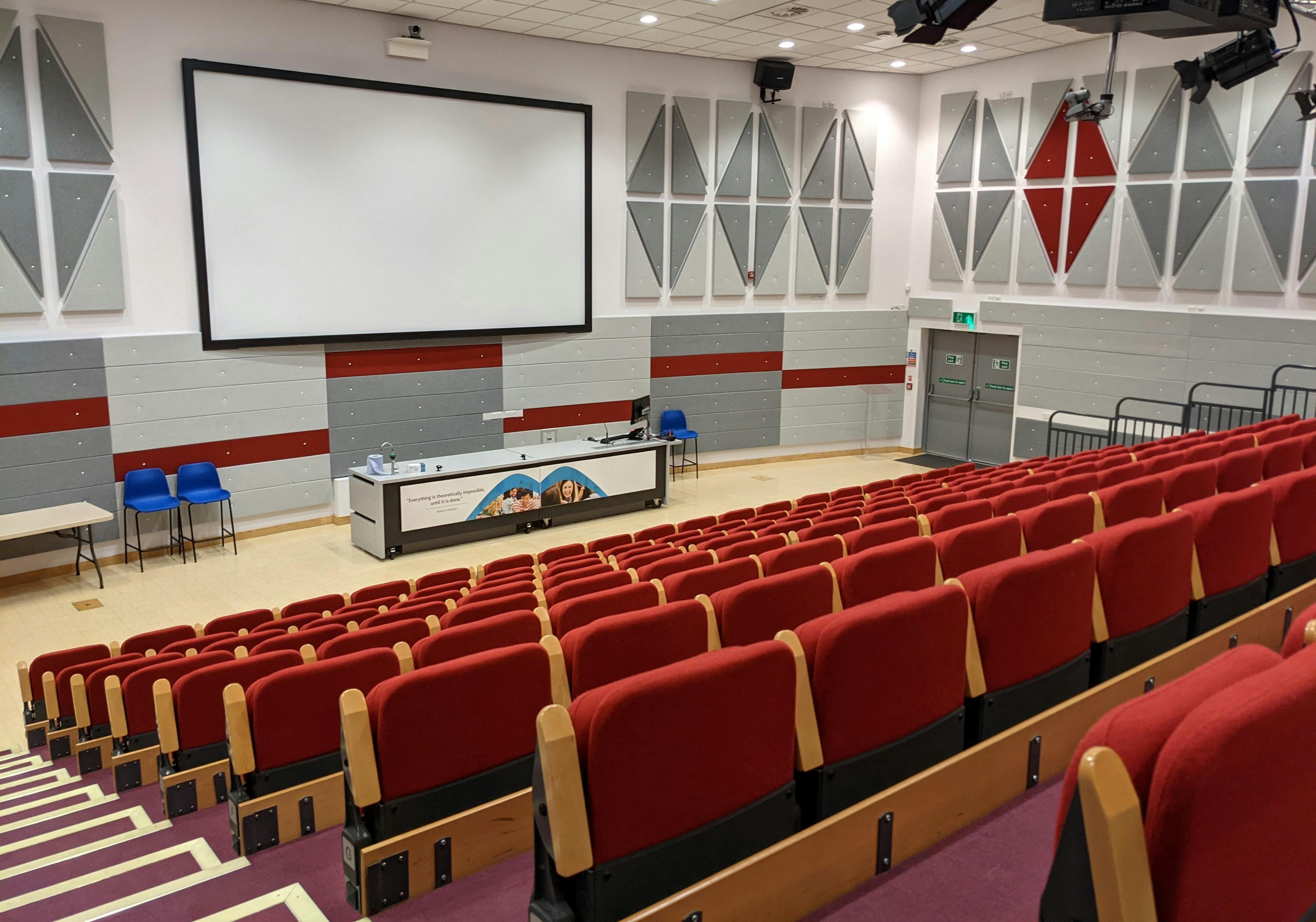 Lecture theatre at National STEM Learning Centre with tiered seating for conferences and workshops.