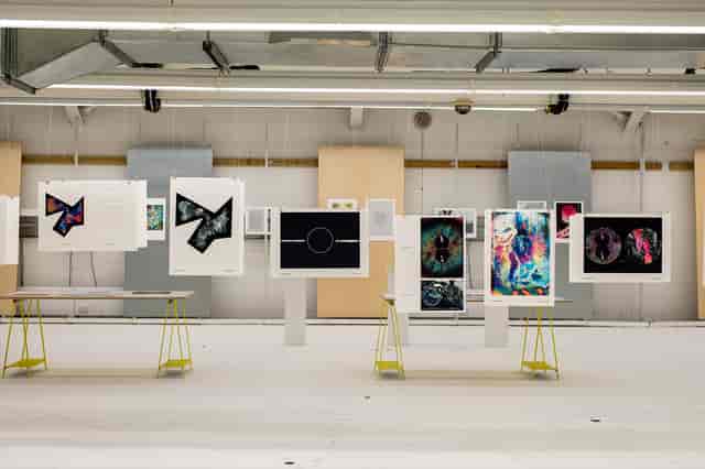 Modern exhibition space with vibrant artwork, ideal for art showcases and networking events.
