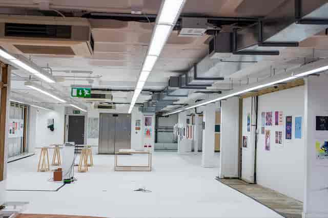 Versatile event space with natural light, ideal for exhibitions and corporate gatherings.