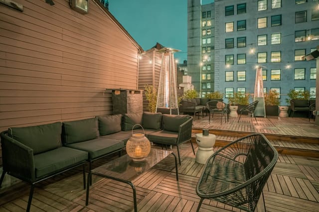 Stylish rooftop venue with cozy seating for intimate gatherings and networking events.