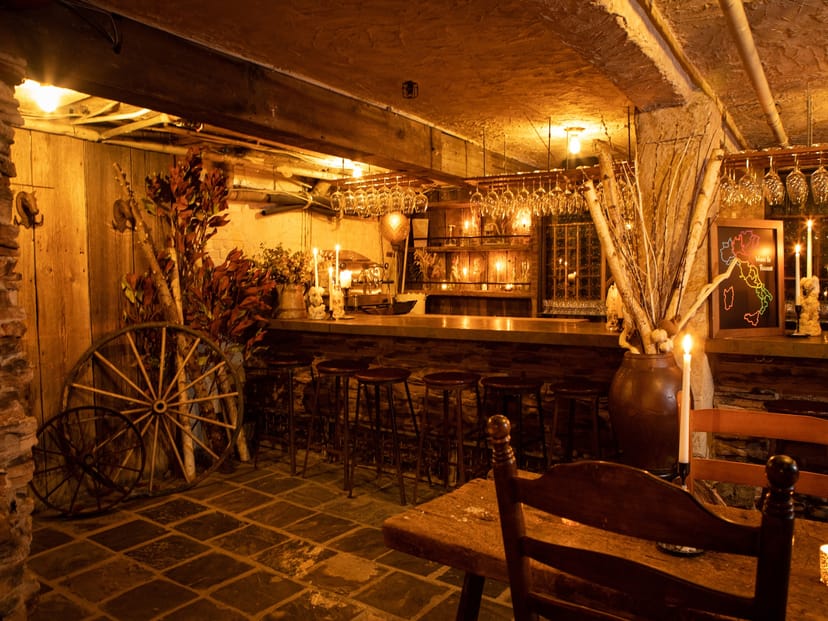 Rustic wine bar at Peasant, ideal for intimate gatherings and cocktail receptions.