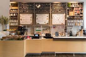 Main floor of 2Beans café with organized counter, perfect for networking events.