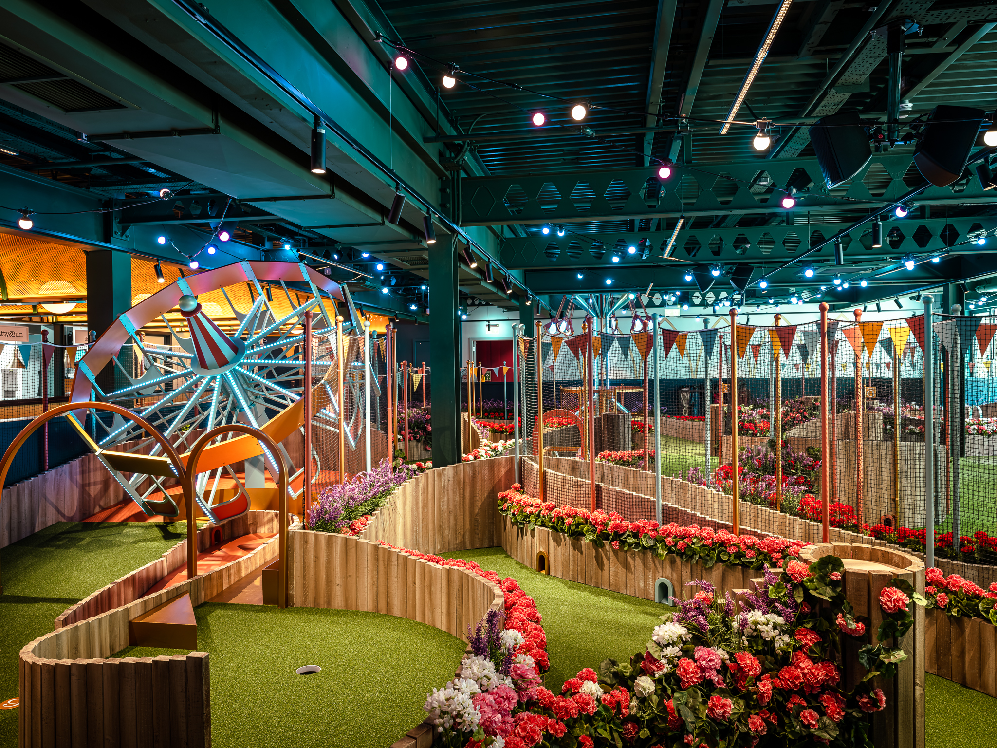 Vibrant Boathouse event space with colorful decor for interactive networking events. - Banner