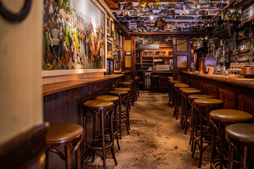 Cozy bar setting in The Dead Rabbit's Occasional Room, perfect for networking events.