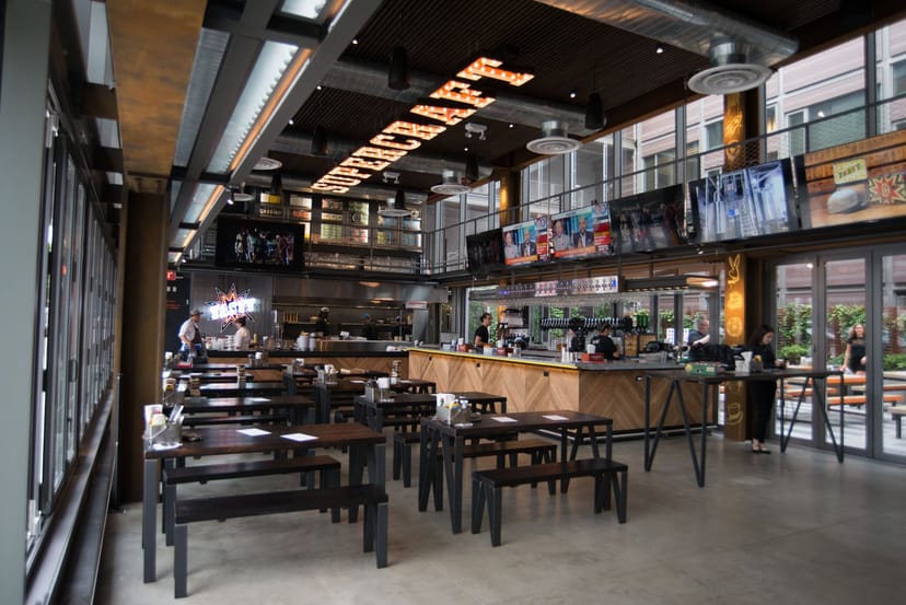 Modern dining space at Clinton Hall, ideal for networking events and casual meetings.