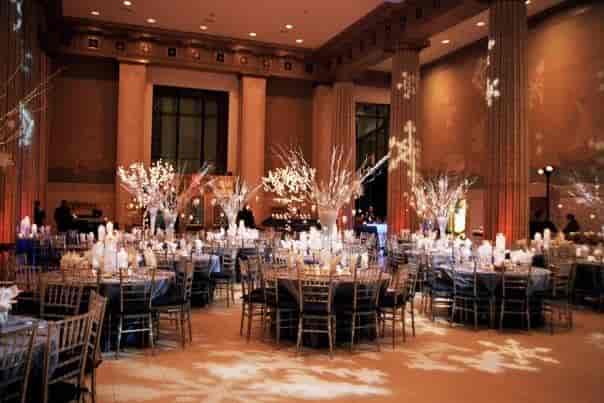 Elegant event space at Broad Street Ballroom with round tables for weddings and corporate events.