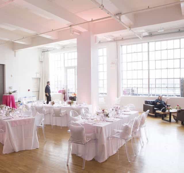 Elegant event space with floral centerpieces, ideal for weddings and corporate gatherings.