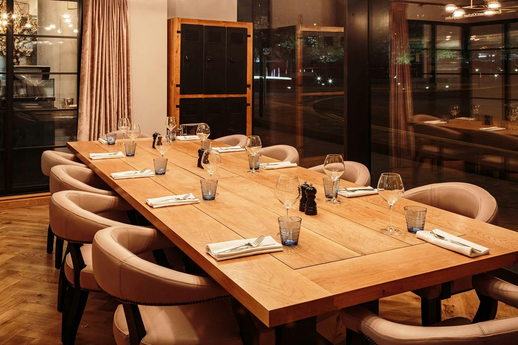 Private dining table at Embankment Kitchen, ideal for intimate meetings and events.