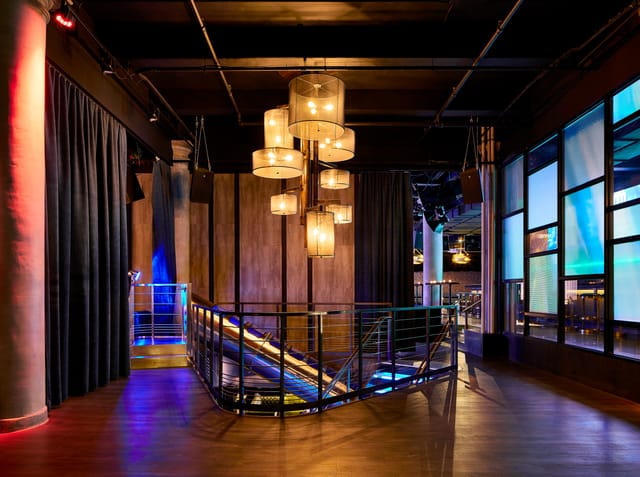 Elegant Ballroom 71-72 with modern lighting, ideal for upscale events and networking.