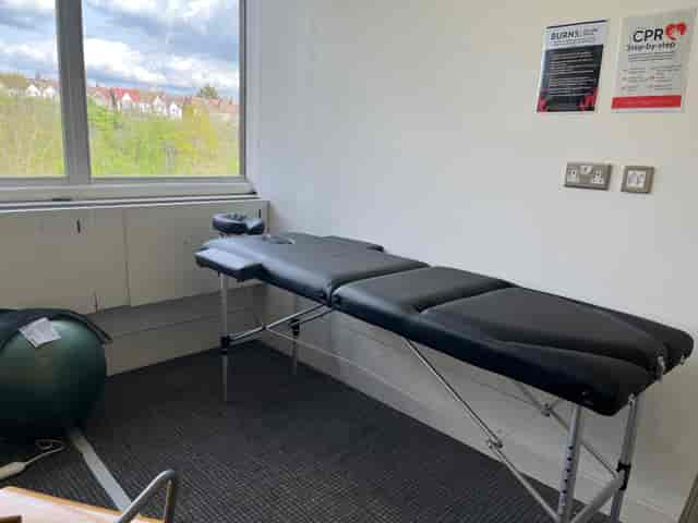 Wellness treatment table in serene room for massage therapy at London events.