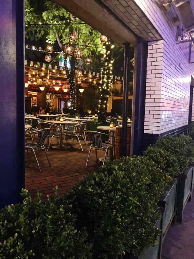 Outdoor dining space at B Bar and Grill, perfect for casual networking events and receptions.
