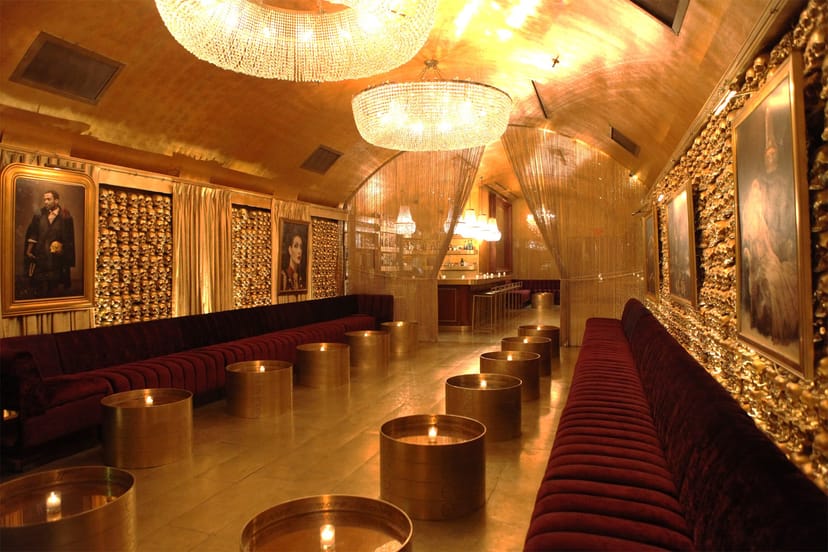 Luxurious private event space with chandeliers, ideal for upscale gatherings and receptions.