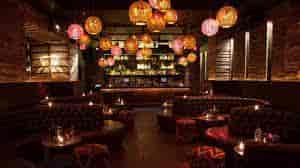 Stylish venue with warm lighting, ideal for cocktail receptions and networking events.