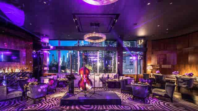 Elegant Ascent Lounge with plush seating, ideal for upscale corporate events and celebrations.