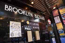 Brooklyn Bazaar entrance with vibrant signage, ideal for events and performances.