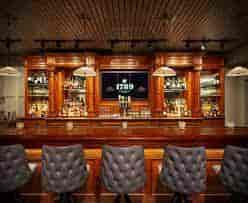 Sophisticated bar at 1789 Restaurant, ideal for networking events and cocktail receptions.