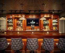Sophisticated bar at 1789 Restaurant, ideal for networking events and cocktail receptions.