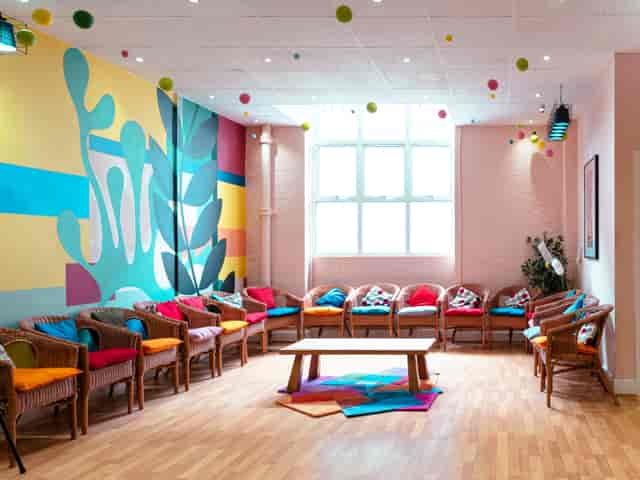 The Matisse London art space with wicker seating for creative workshops and collaborative events.