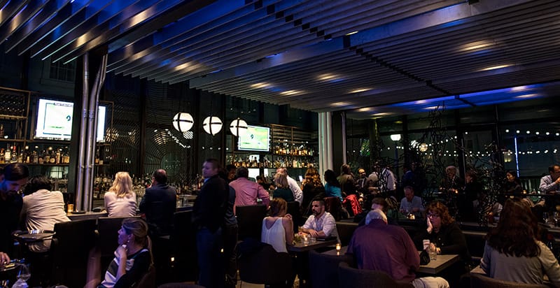 Vibrant bar at Dirty Habit DC, perfect for networking events and social gatherings.