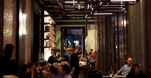 Modern dining space at Dirty Habit DC, perfect for intimate gatherings and networking events.