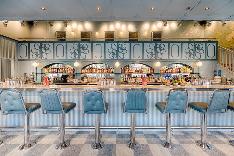 Stylish Morris American Bar with modern stools, perfect for cocktail receptions and networking.
