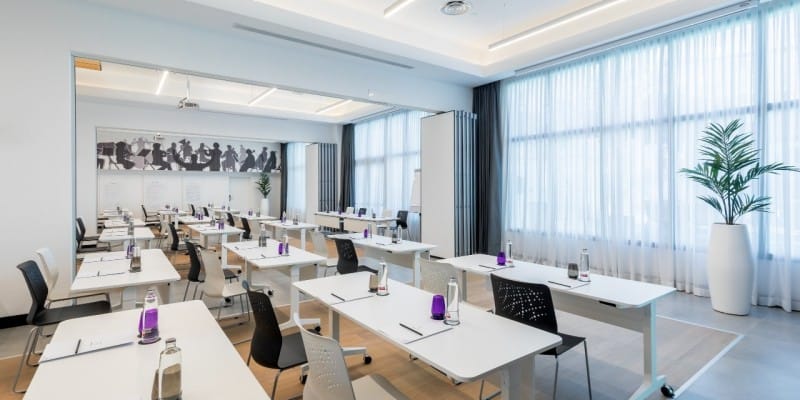 Modern meeting room at Barcelo Imagine Hotel, Madrid; ideal for conferences and workshops.