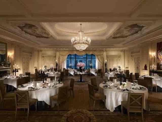 Elegant banquet hall with chandeliers for upscale events in Shangri-La Paris.