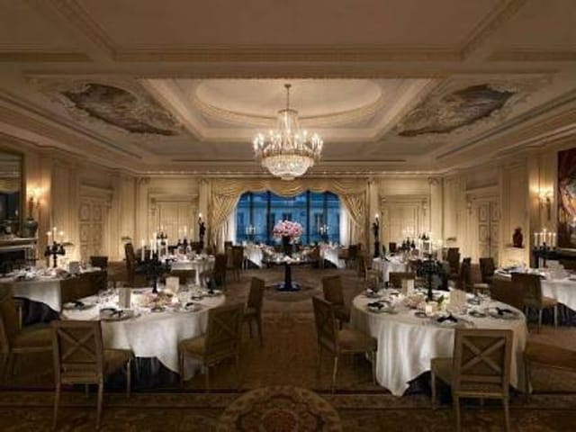 Elegant banquet hall with chandeliers for upscale events in Shangri-La Paris.