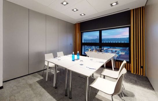 Cibeles Auditorium in Hotel Paseo Del Arte, modern meeting room for creative brainstorming.