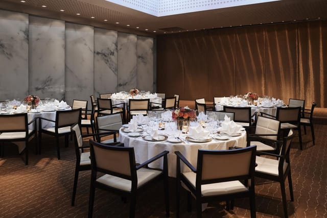 Elegant dining room at Grand Hotel Stockholm, perfect for upscale events and corporate dinners.