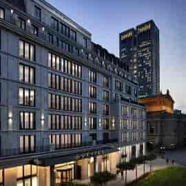 Modern hotel facade of Le Marais, Sofitel Frankfurt Opera, ideal for corporate events.