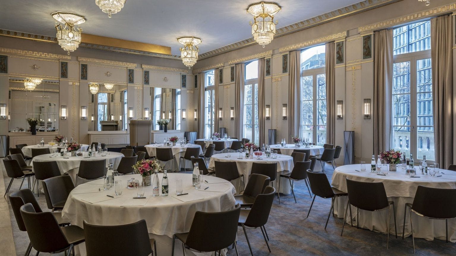 Cristal Ballroom in Lutetia Paris, elegant event space with floral centerpieces and chandeliers.