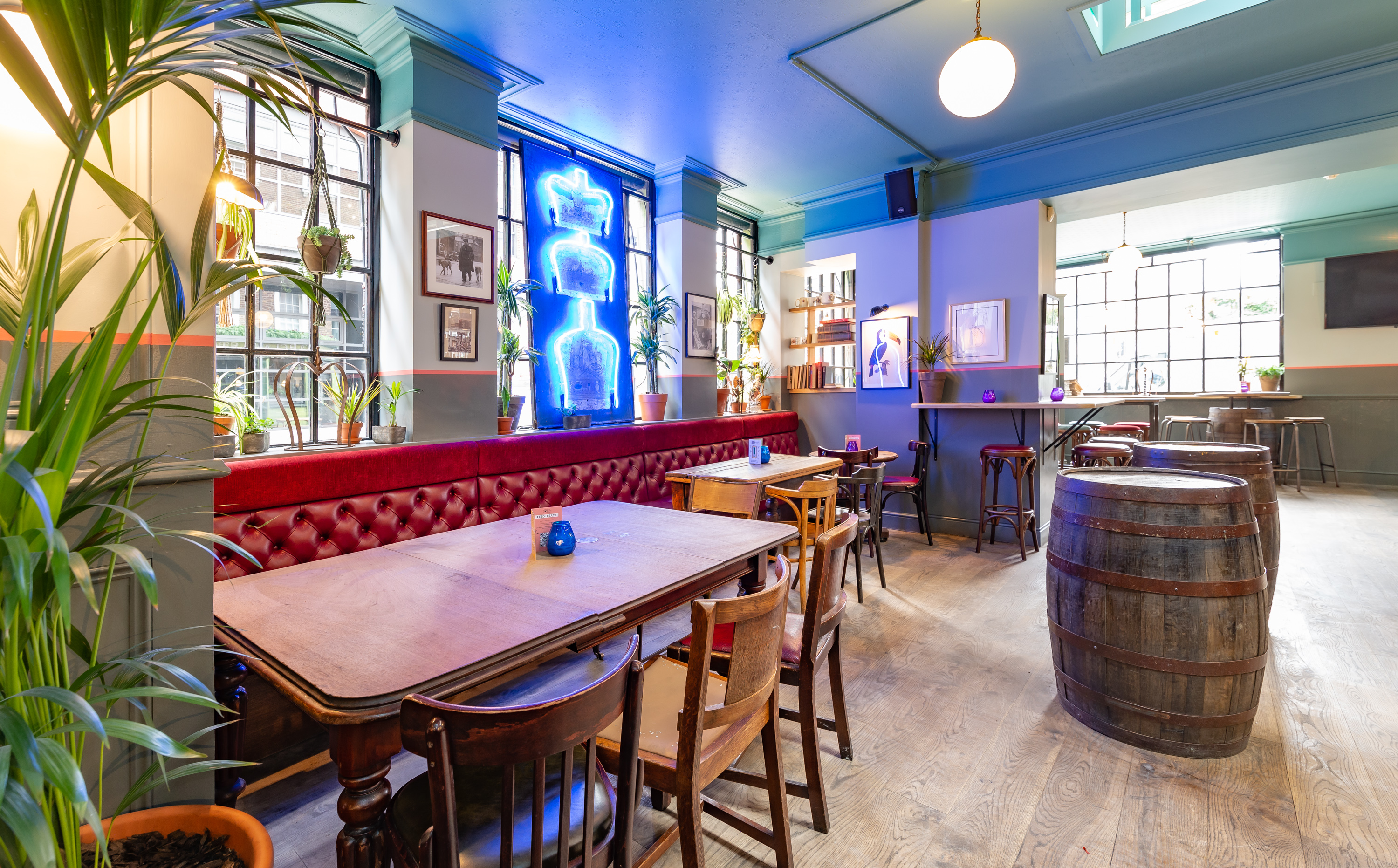 Stylish dining room with cozy seating for casual meetings and events at Three Crowns.