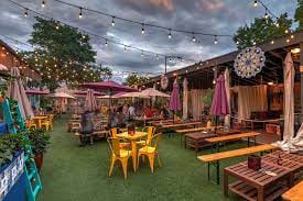 Tea House Cabana-Style venue with string lights for summer gatherings and networking events.