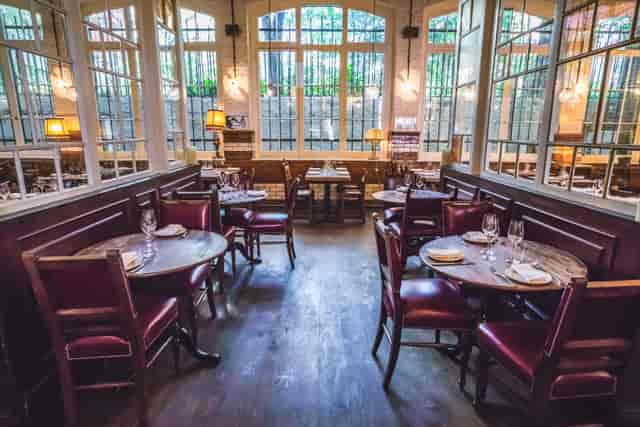 Charming Ibérica Farringdon restaurant with warm lighting for intimate gatherings and meetings.