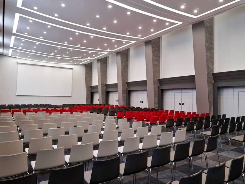 Conference room at Orsay, Pullman Paris with modern chairs for events and presentations.