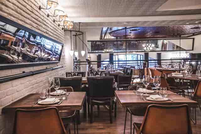 Stylish dining space in Ibérica Canary Wharf, ideal for corporate events and networking dinners.