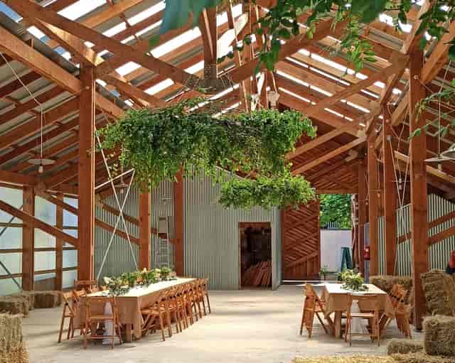 Rustic wooden event space at The Barn @ Oasis Farm, perfect for weddings and retreats.