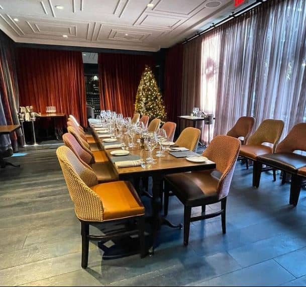 Elegant dining table at Brasserie Liberté, perfect for holiday gatherings and corporate events.